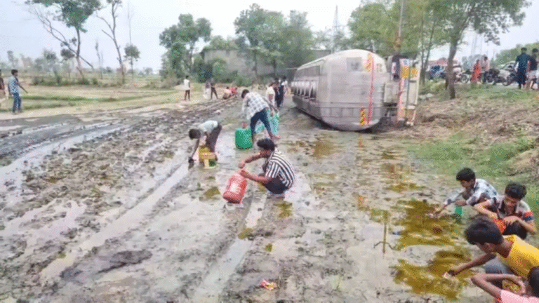 A tanker full of refined oil overturned