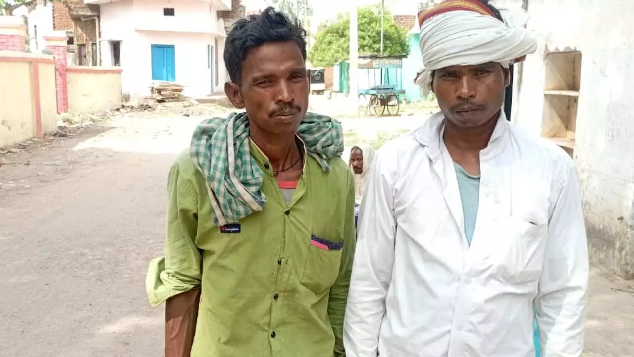 A helpless father is making rounds of the post office to get his Aadhaar card made